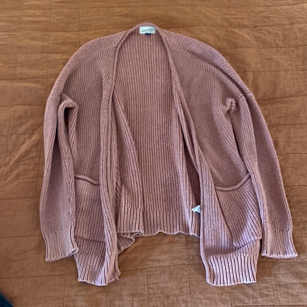 Pink knit sweater with pockets